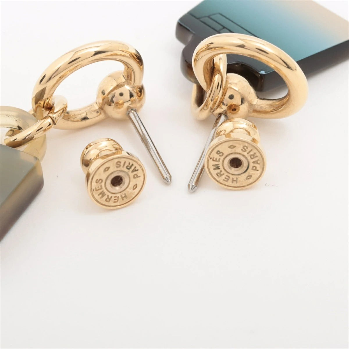 Hermes Amulet Maroquinier Earrings Buffalo Fawn Blue Gold Earrings