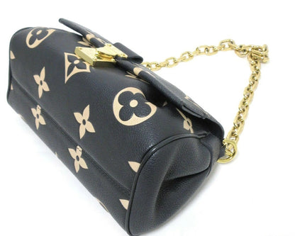 Louis Vuitton Monogram Empreinte Bicolor Favorite NM M45859