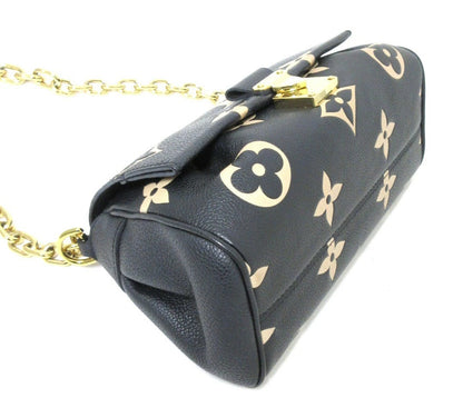 Louis Vuitton Monogram Empreinte Bicolor Favorite NM M45859